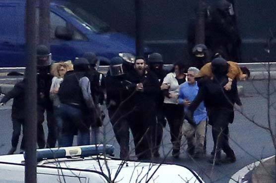 France 'faced down' attacks but still under threat: French PM