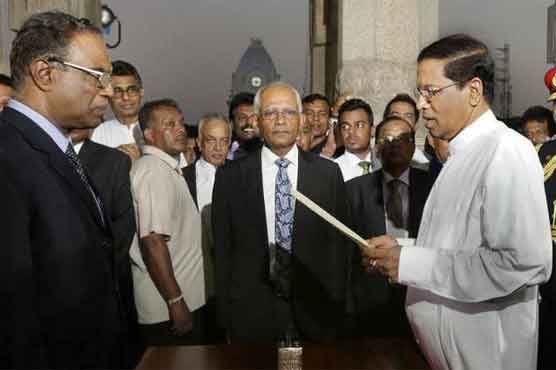 Sirisena sworn in as Sri Lanka's new president