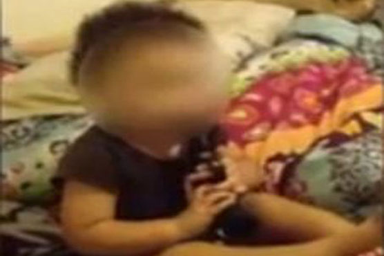Indiana couple arrested after video shows handgun in toddler's mouth