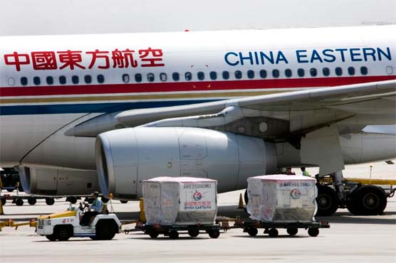 China travelers open emergency exits to protest flight delay