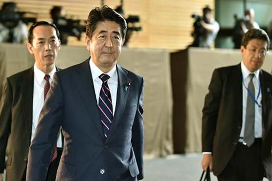 Japan Cabinet OKs record military budget with eye on China