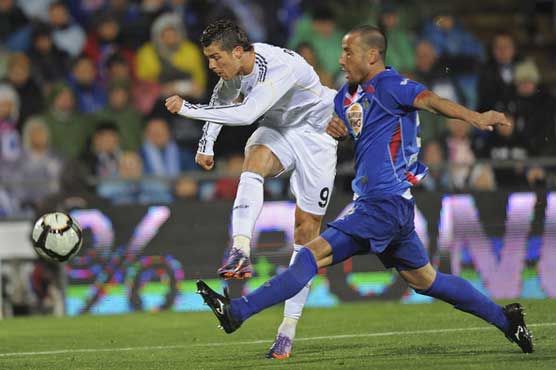 Ronaldo nets 2 as Real wins 3-0; Atletico keeps pace