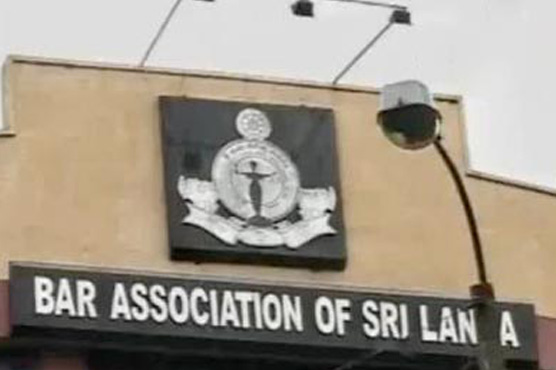 Sri Lanka bans top judge from conference over coup claim