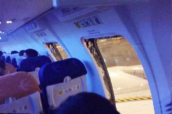 Overheated Brazil passengers open plan emergency exits