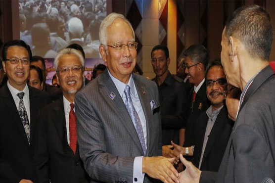 Malaysia trims economic sails in wake of oil price rout