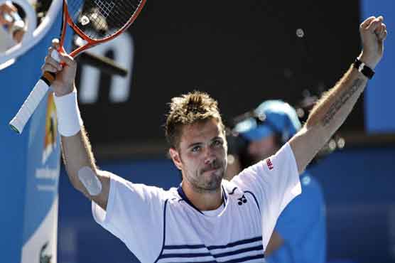 Tennis: Defending champion Wawrinka into Open last 16