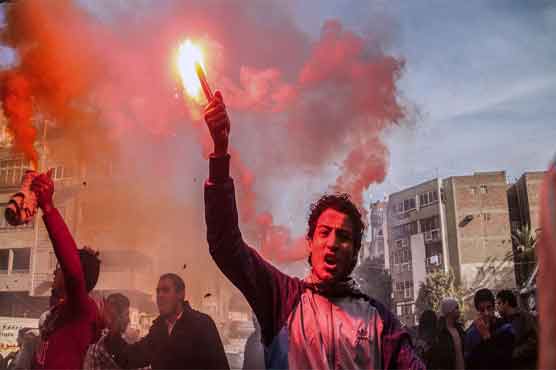 14 killed as clashes mar Egypt revolt anniversary