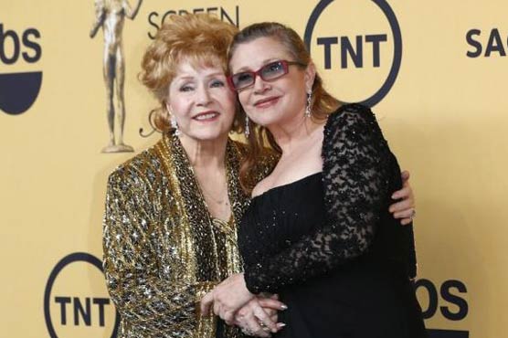 Debbie Reynolds, with SAG lifetime award, says she 'ain't down yet'