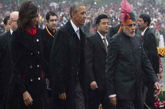 Rain fails to dampen cheer as Obama attends India parade