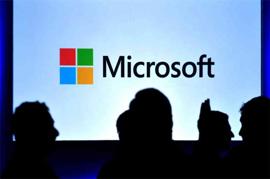Microsoft profit dips as revenue rises 