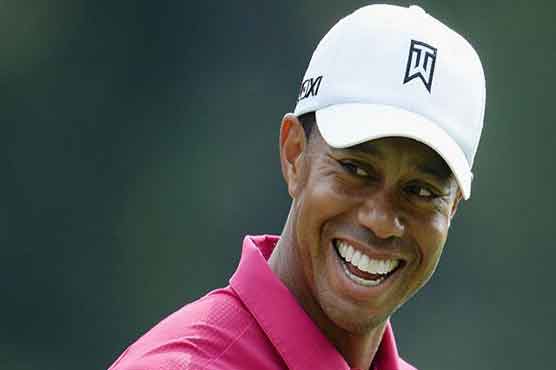 Golf: No toothless Tiger: Woods all smiles for return