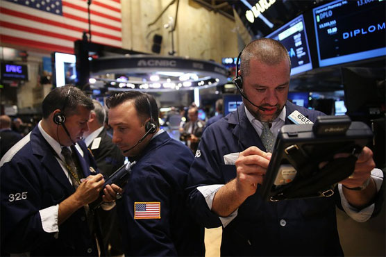 US stocks sink on weak earnings; Nasdaq -1.9%