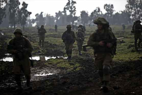 Israel buries soldiers, says Hezbollah doesn't want conflict
