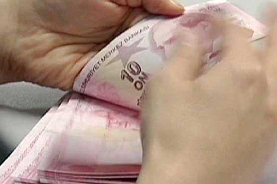 Turkish currency hits new record low against dollar