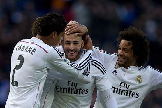 Benzema nets 2 as Madrid beats Sociedad 4-1 without Ronaldo