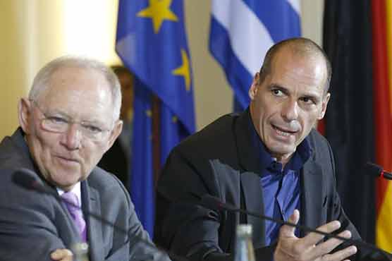 Euro holds steady after Greece defaults