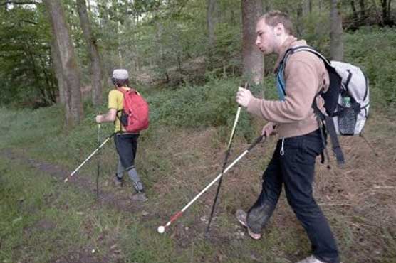 Blind French hikers cross mountains with special GPS
