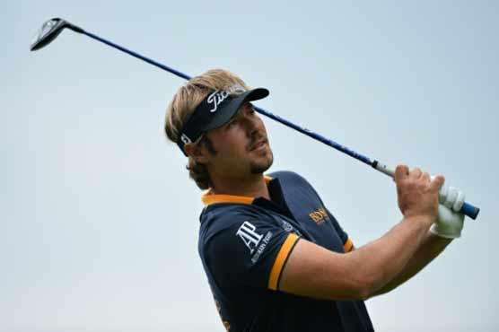 Golf: Dubuisson shares lead as storms hit French Open