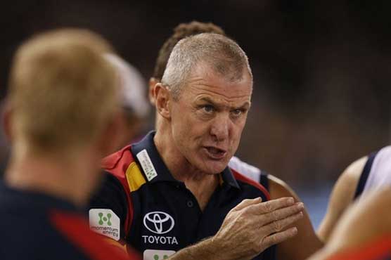 Son charged with murder after Aussie Rules coach killed