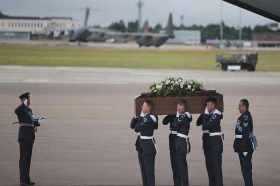 Britain holds a minute's silence for Tunisia victims