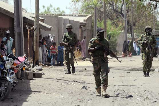 Boko Haram suicide bombers 'kill scores' in NE Nigeria village: army