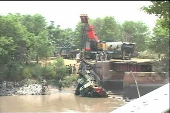 Gujranwala train disaster: Damaged engine carried out of canal