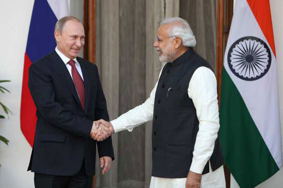 Putin tells India's Modi will try yoga