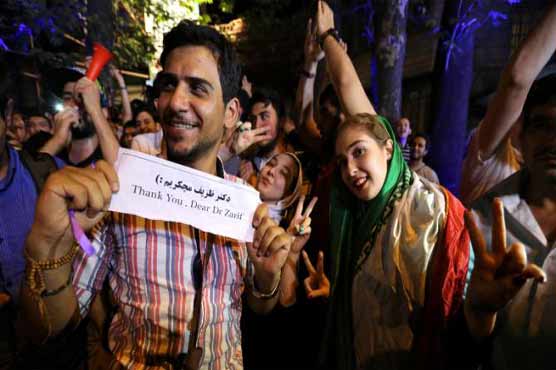 Iranians celebrate nuclear deal, hail Zarif as hero