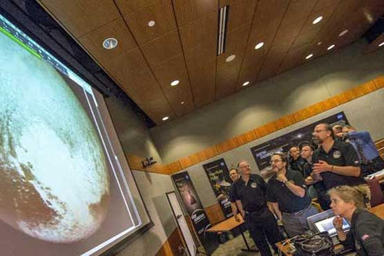 US spacecraft whizzes past Pluto in historic flyby