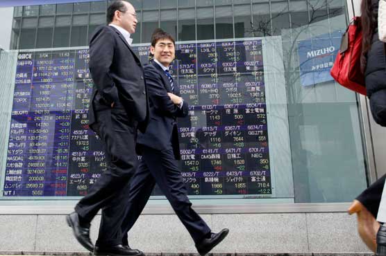 Asia stocks mostly up after China data, eyes on Fed