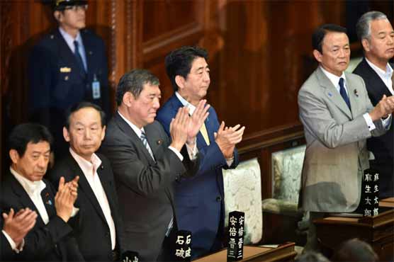 Japan lawmakers pass security bills despite public anger 