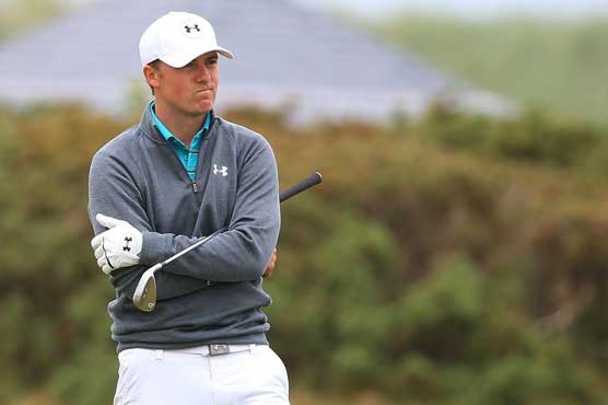 Golf: Rain eases, play to resume at Open