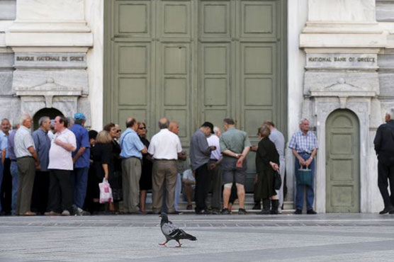 Banks to reopen, taxes hiked as Greece prepares to reboot economy