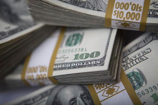 Dollar firm in Asia with focus on Fed rate hike timing