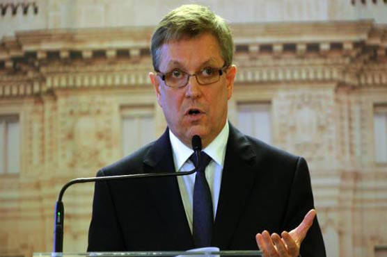 Hungary cuts interest rate to record low, ends easing cycle