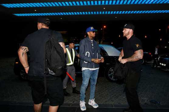 Chris Brown parties in Macau as Philippines jails his promoter