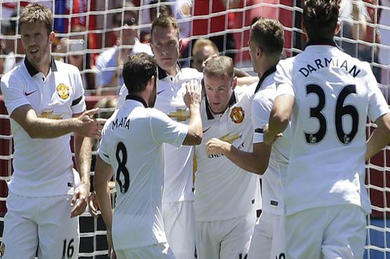 Football: Rooney on target as United down Barca