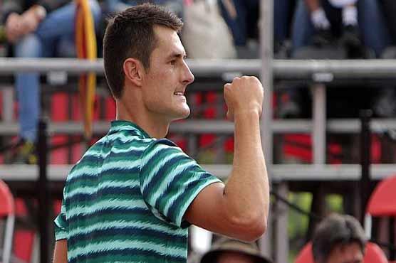 Tennis: Tomic shrugs off troubles to defend Bogota title