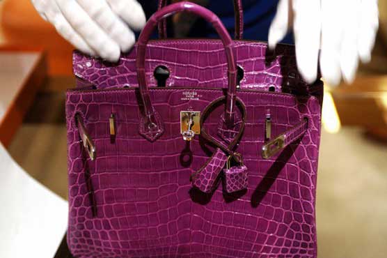 Crocodile-skin handbag sells for record $222,912: Christie's 