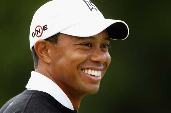 Woods rallies after awful start to open Memorial with 73