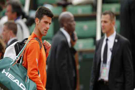 Djokovic-Murray French semi suspended; winner faces Wawrinka
