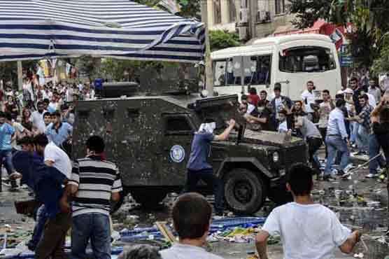 2 killed in explosions at Kurdish rally in Turkey