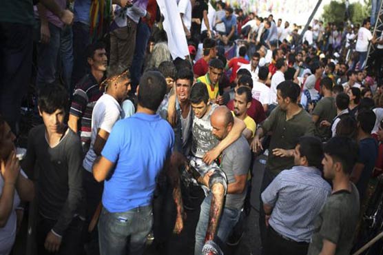 2 killed in explosions at Kurdish rally in Turkey