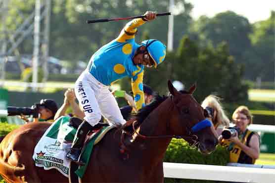 American Pharoah runs into history with Triple Crown