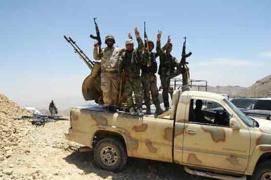 US-led raids hit IS battling rebels, Qaeda in Syria