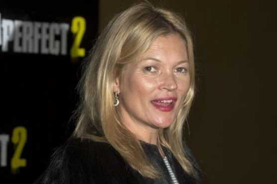 Kate Moss escorted off plane after being disruptive