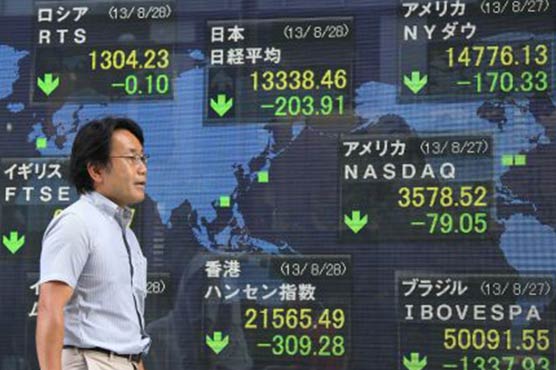 Asian markets mostly higher, US reports lift dollar
