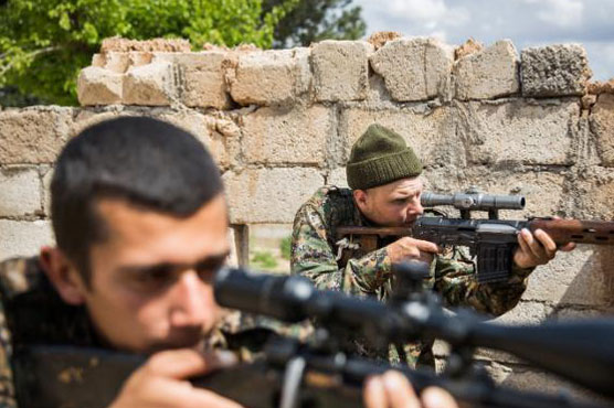 Kurds advance towards IS-held Syria border town: monitor