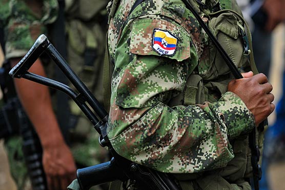 FARC kill three police, cut power to 500,000 in Colombia