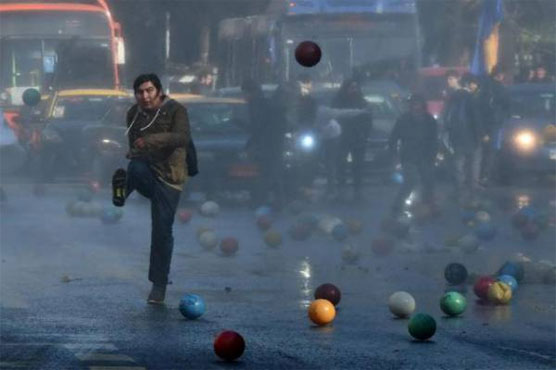 Chile students pelt cops with footballs as Cup kicks off